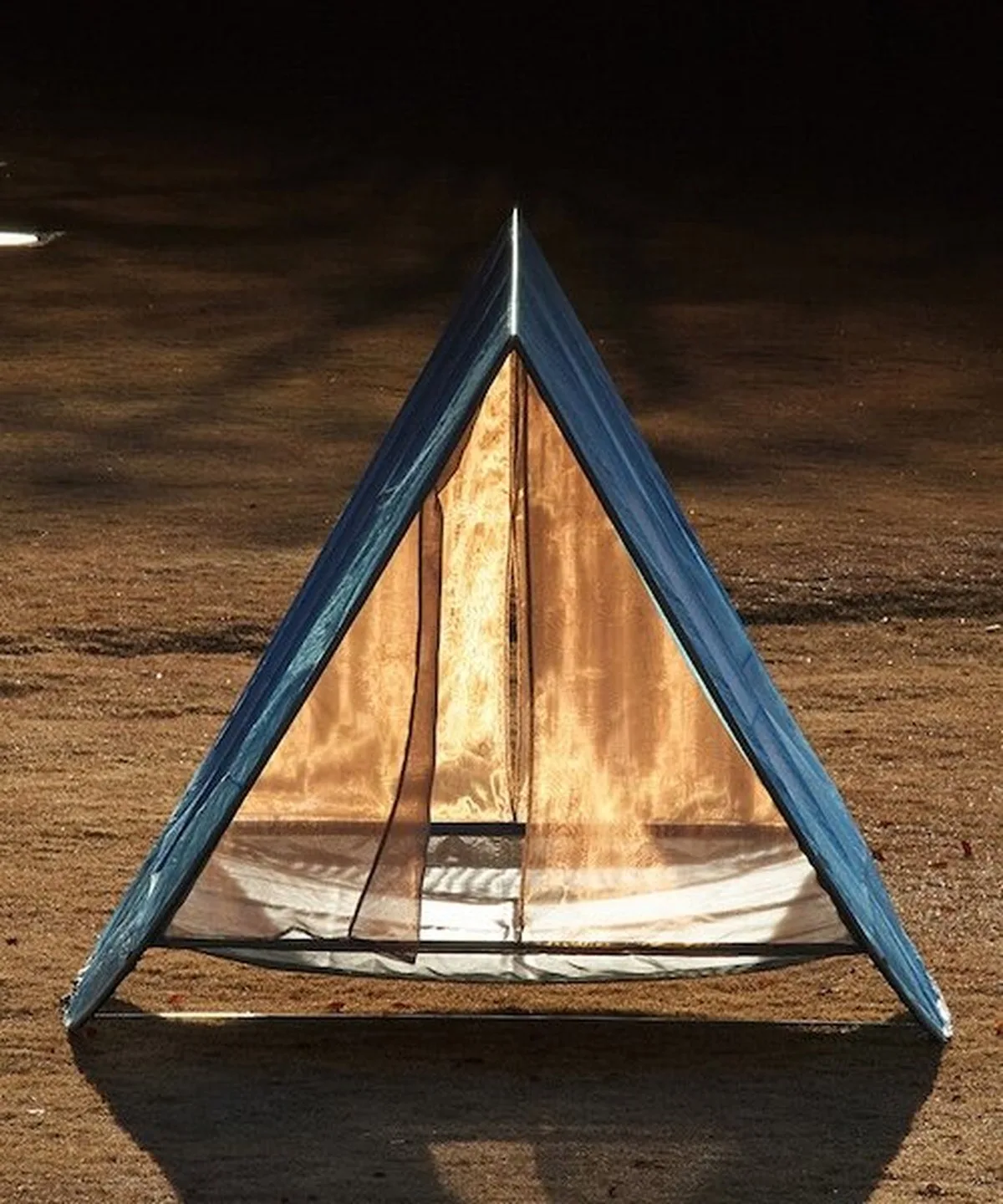 tato architects suspends arc tent somewhere between a hammock and a campsite