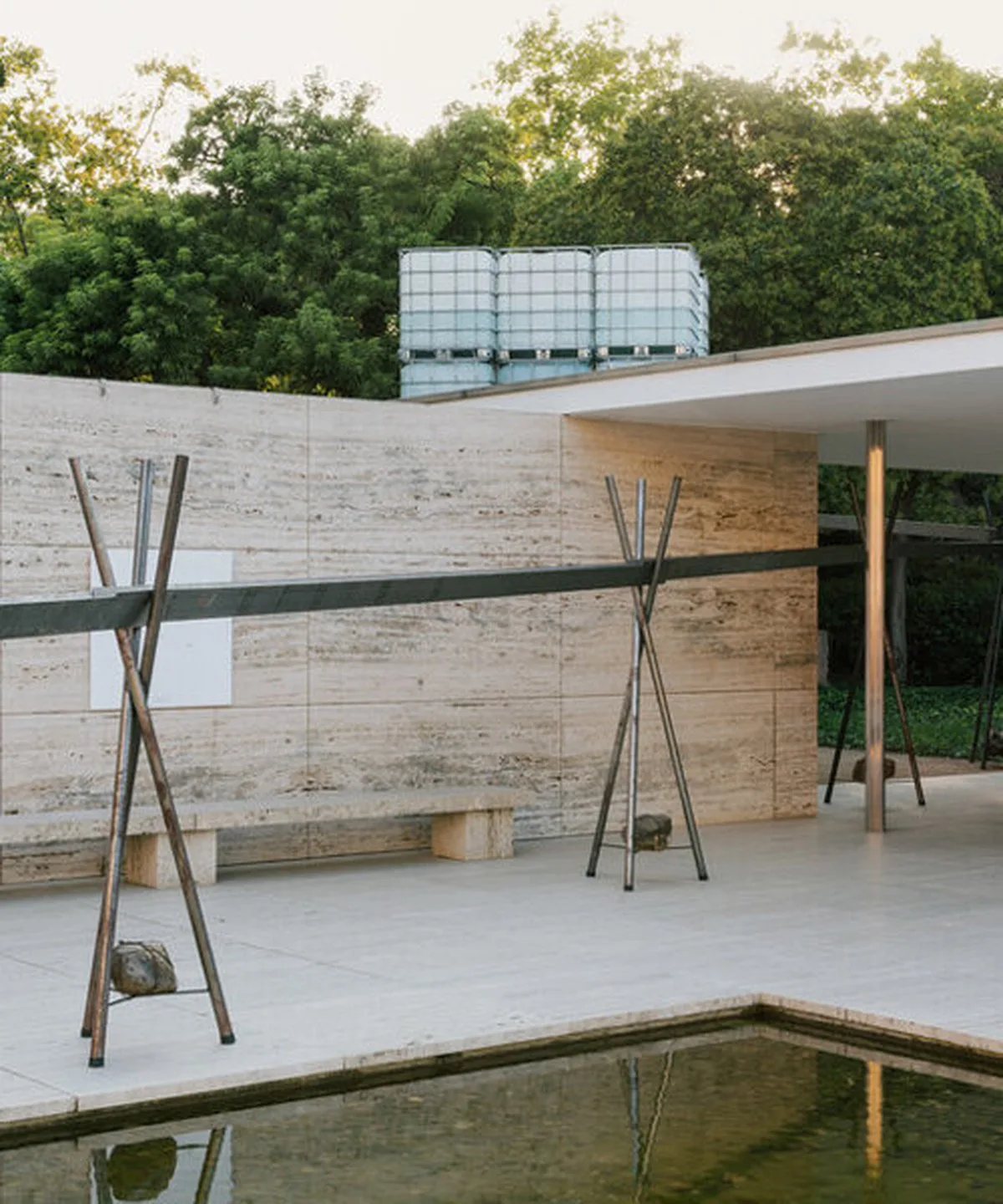 twelve tanks and dripping aqueduct trace water loss at mies van der rohe barcelona pavilion