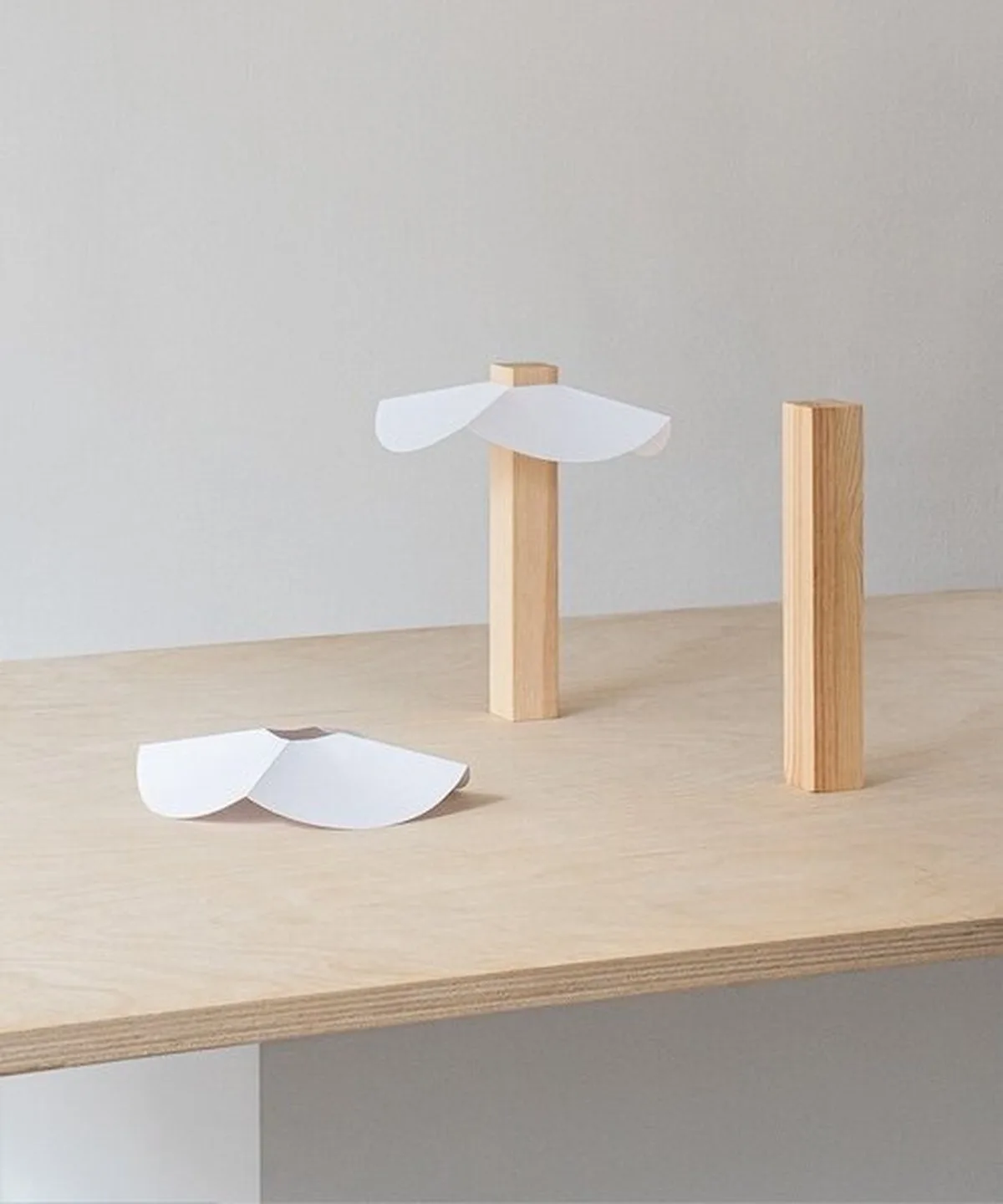 byunggwon na’s ALIT lamp balances ceramic, wood and light in one quiet composition