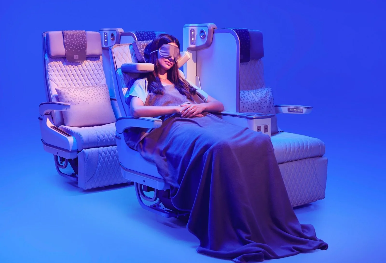 emirates new premium economy seat featuring privacy screen