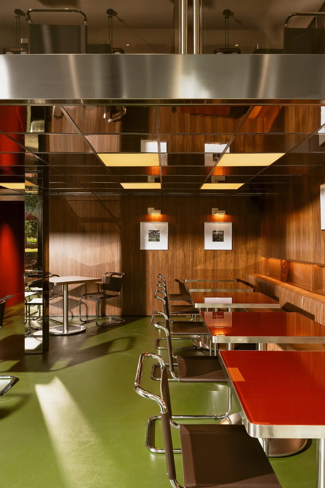Seating area in bar beneath mezzanine level