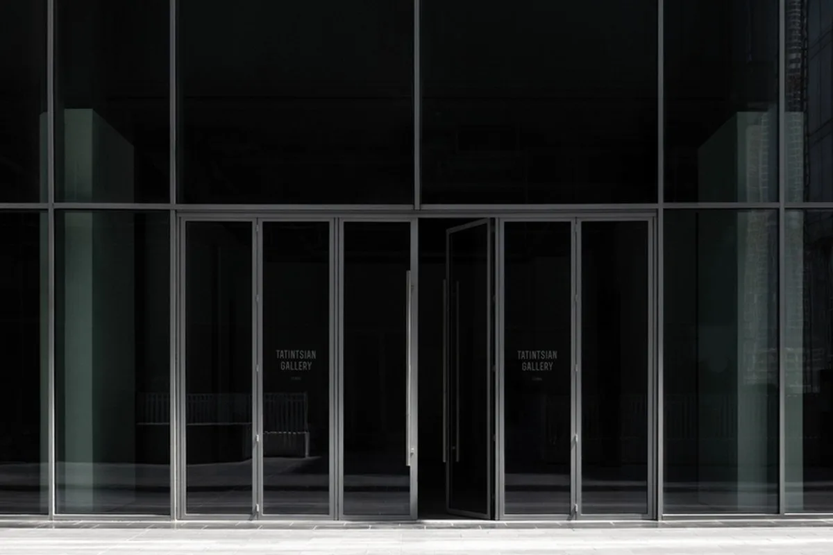 dubai gallery pairs open white exhibition halls with a concealed, brick-toned museum room - 1