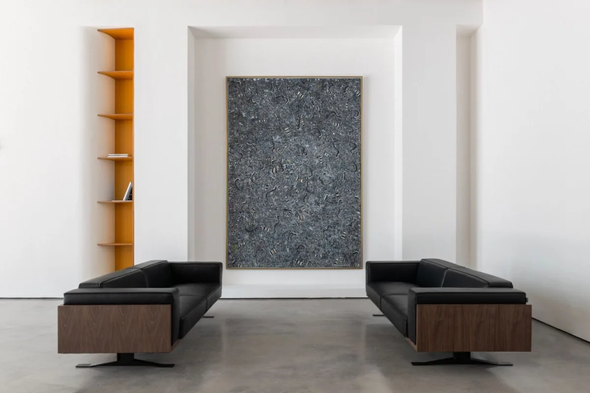 dubai gallery pairs open white exhibition halls with a concealed, brick-toned museum room - 2