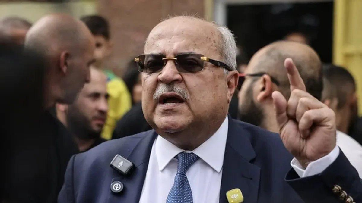 Ahmad Tibi, head of the Arab Movement for Change (Ta'al) party, speaks to the press after casting his ballot at a polling station in the predominantly-Arab city of Tayibe on October 27, 2026, on the day of Israel's legislative election. A deeply divided Israel headed to the polls for the first time 