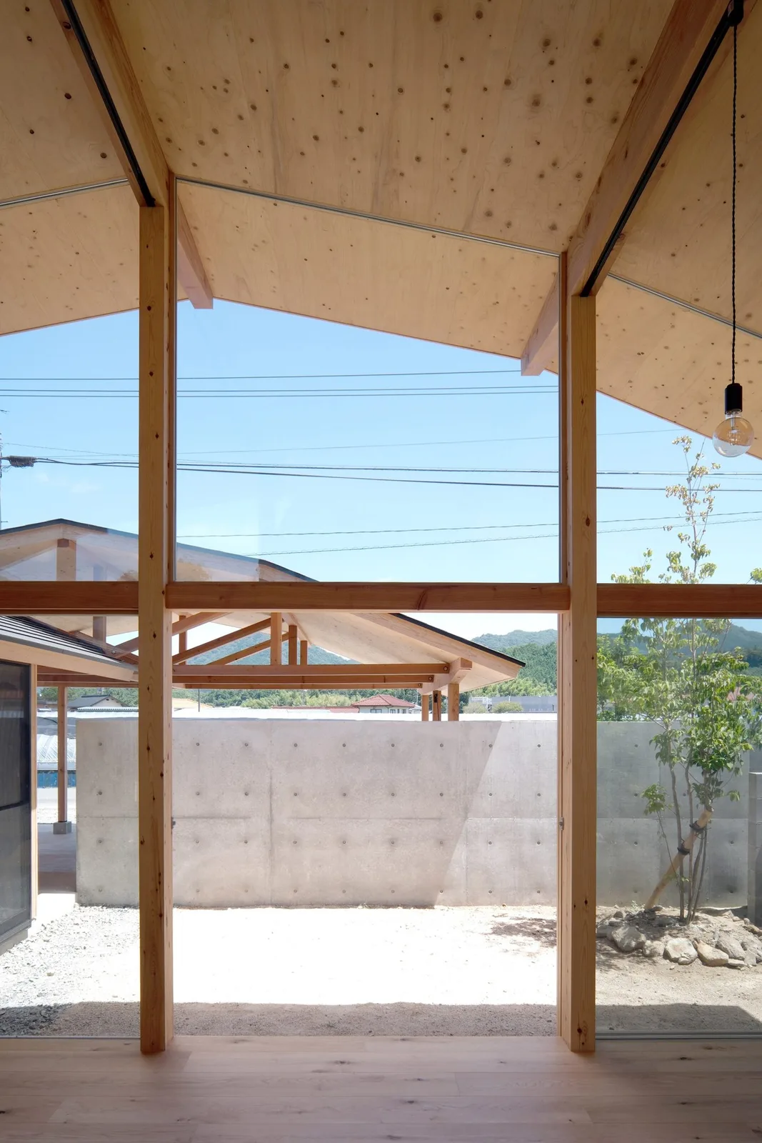 House in Yakami by Enter-Archi