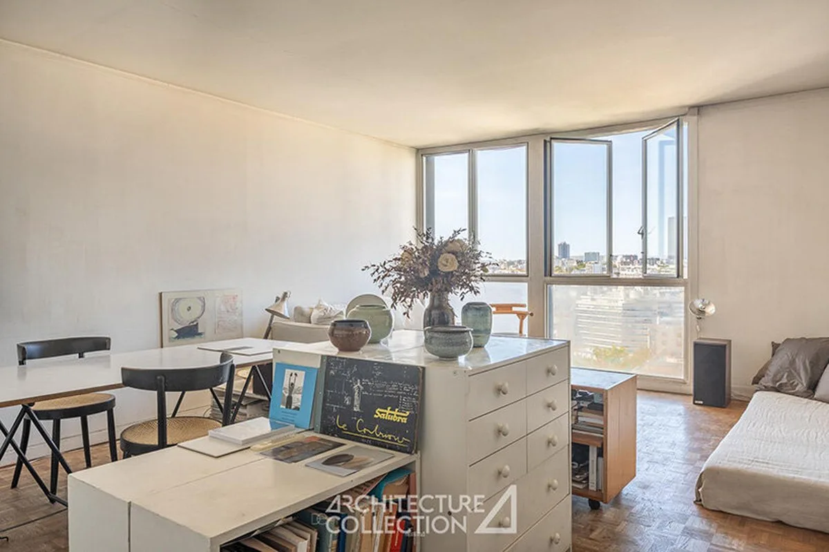 charlotte perriand's built-in interiors survive inside 1960 paris tower - 1