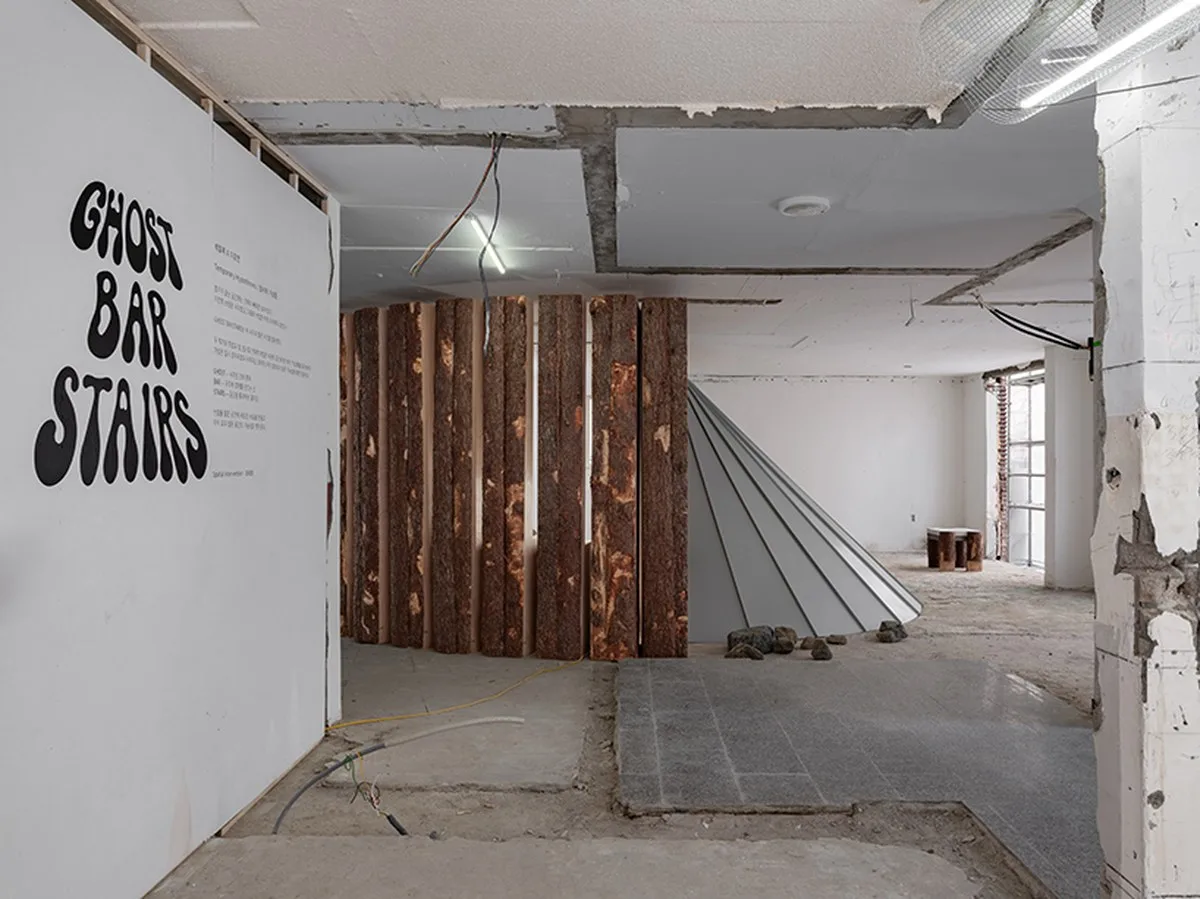 sculptures made of timber and steel occupy raw concrete shell in seoul before demolition - 1