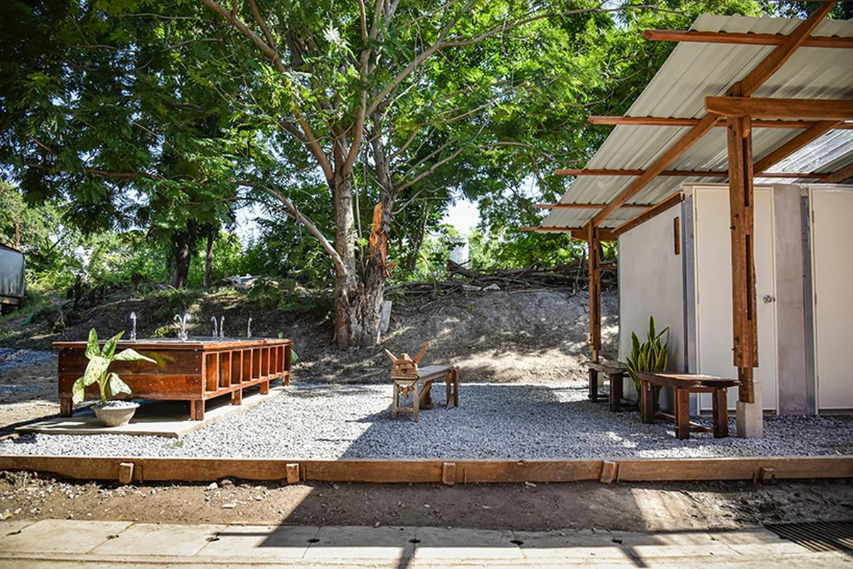 volunteer camp in thailand hand-builds school toilet from reclaimed wood - 1